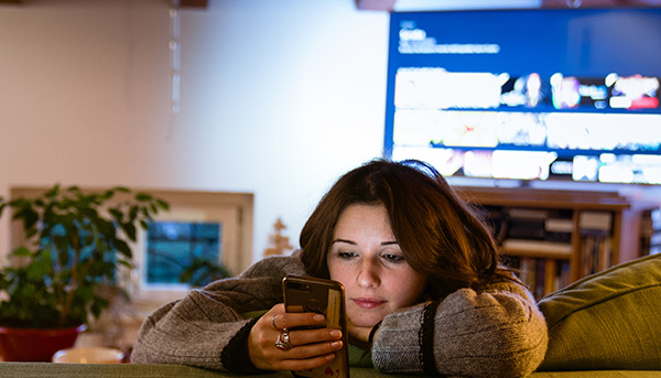 Woman on couch, shopping